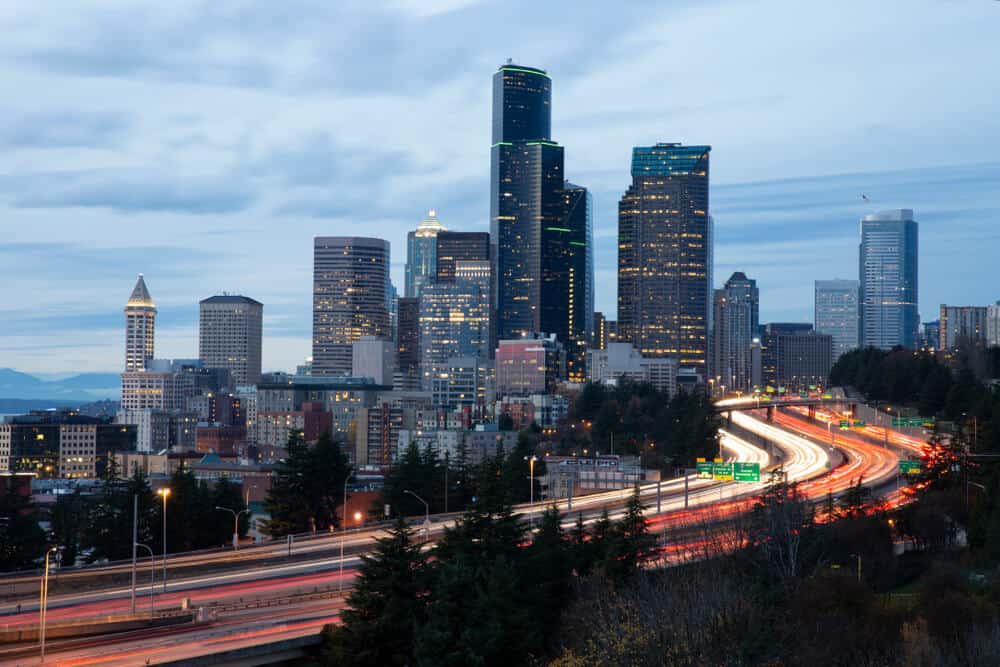 seattle skyline with freeway with cars with driver records