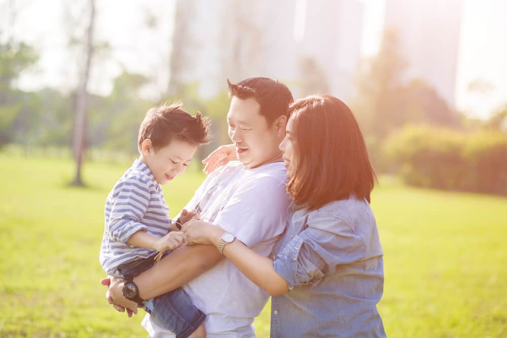 asian family with baby