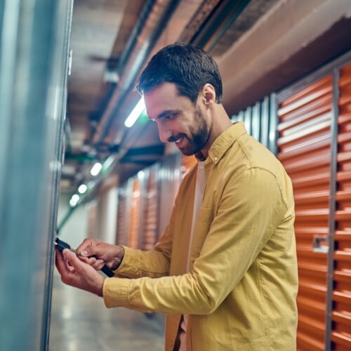 Man locks his storage unit - cheap renters insurance in Washington