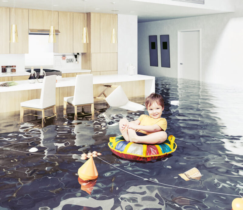 Small child floating in an inner tube through a flooded home - cheap home insurance in Washington.