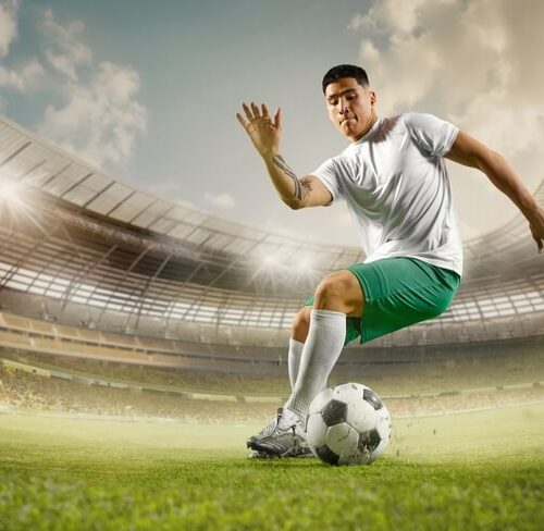 Soccer player on the field with wide-angle lens - cheap insurance in Seatlle.